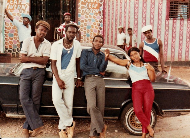 Delroy Wright (back-left), Al campbell (back-center), Winston Hussey (front-center) outside of the Maple Leaf Tavern (where they shot photos for FORWARD NATTY)